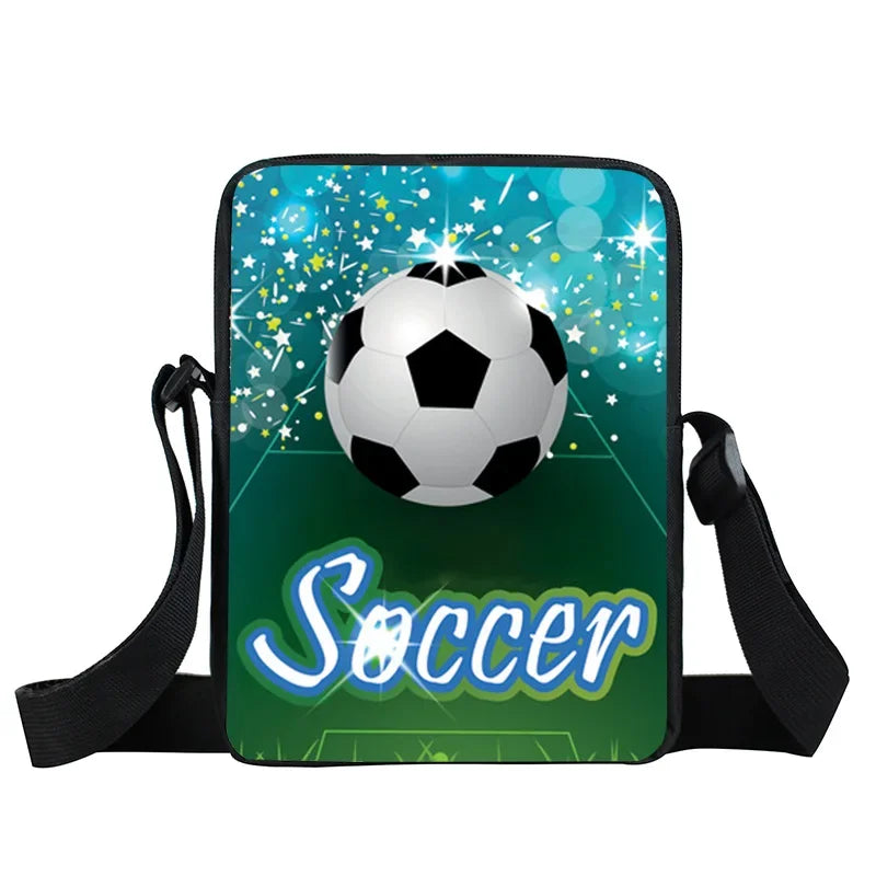 Small shoulder bag with a soccer ball, green pitch design, and 'Soccer' text, featuring an adjustable black strap.