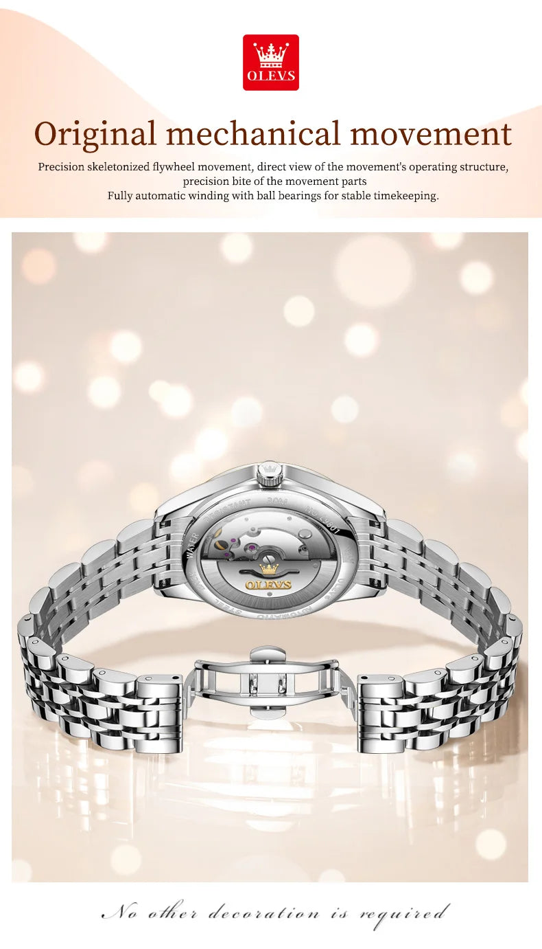 Elegant silver stainless steel women’s mechanical watch, showing the intricate inner automatic movement and clasp.