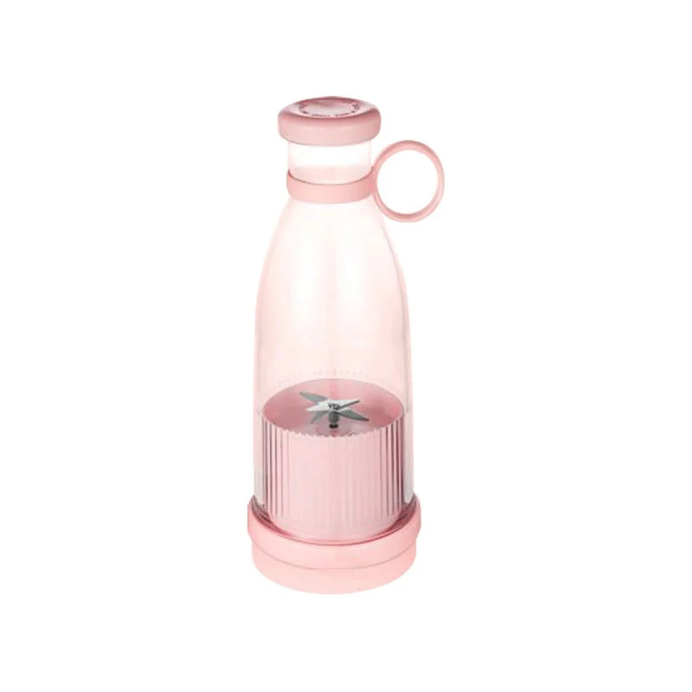 A pastel pink portable blender bottle with a transparent body, ribbed base, and a convenient carrying ring on the cap.