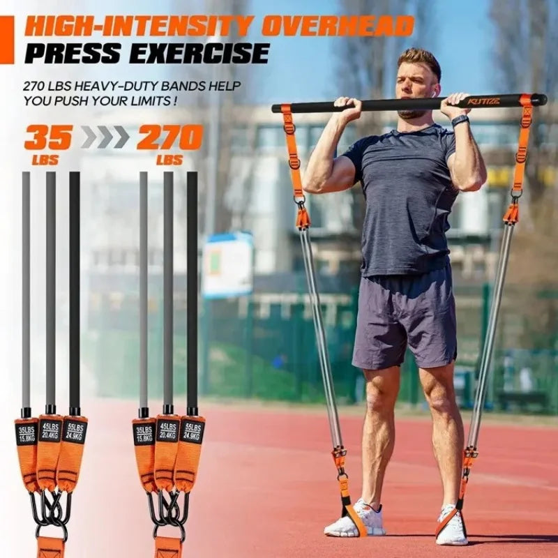 Man performing overhead press with a black Pilates bar and orange resistance bands in a home fitness kit.