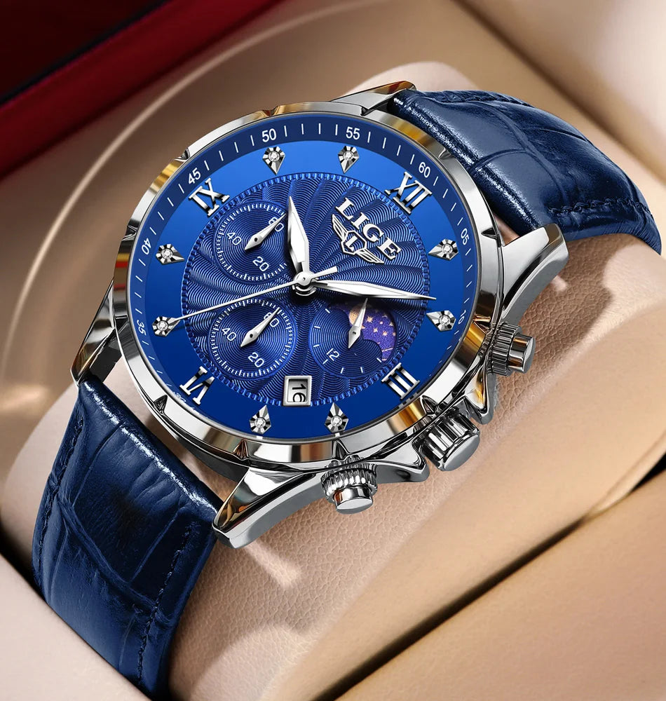 Men’s blue chronograph watch with a textured dial, crystal markers, silver case, and a blue leather strap.