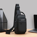 Black anti-theft crossbody chest bag featuring a built-in USB port, secure combination lock, and adjustable strap.