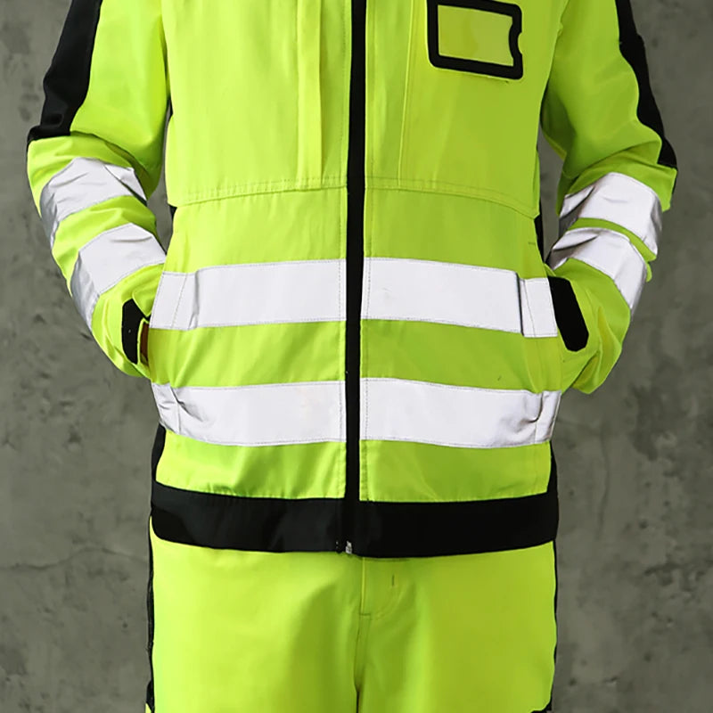 Neon yellow and black high-visibility work jacket with reflective strips and zipper closure.