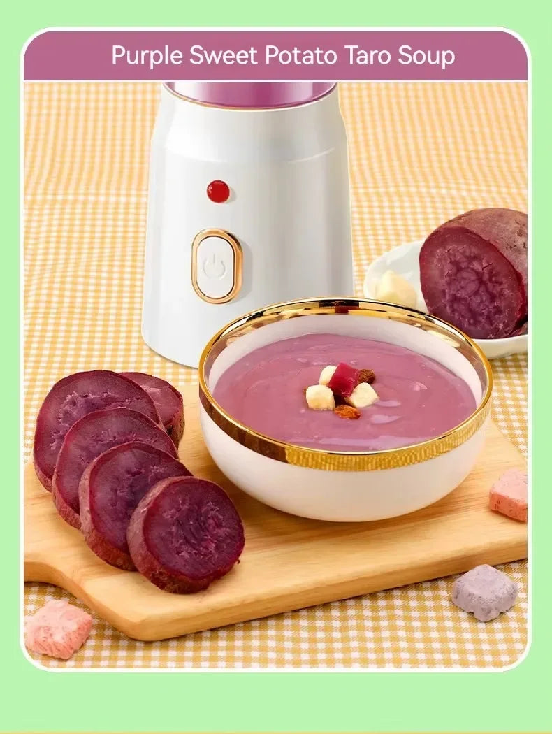 A bowl of purple taro soup next to a white electric blender and sliced purple sweet potatoes on a wooden board.