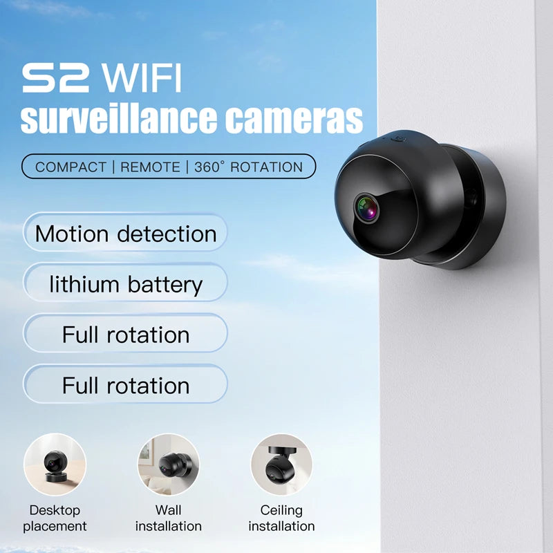 Compact black 360° wireless security camera showing motion detection and versatile wall, ceiling, or desktop mounting.