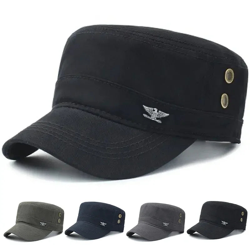 Black military-style cotton cap with a flat top, stiff peak, side eyelets, and a silver eagle emblem.