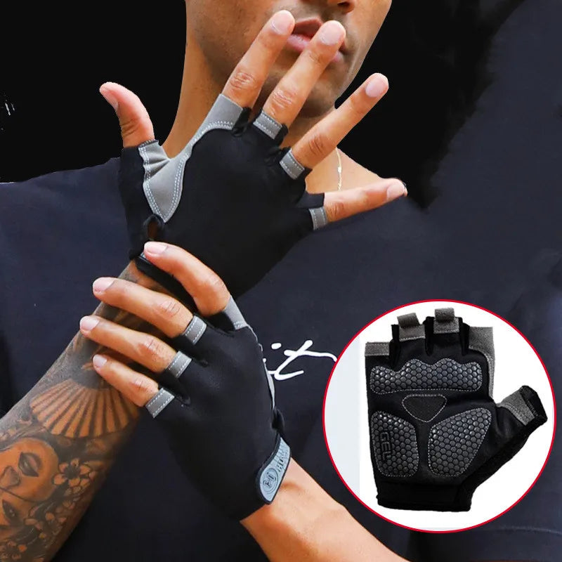 Black and grey fingerless cycling gloves with gel-padded palms, worn by a man with a tattoo on his arm.