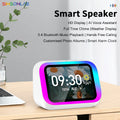 White smart speaker with a vibrant LED-lit screen displaying time, weather and daisy wallpaper on a desk.