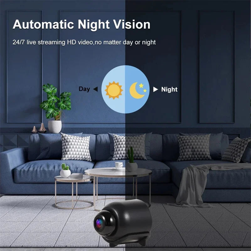 Black, rounded plastic security camera with a front-facing lens for day and night video monitoring.