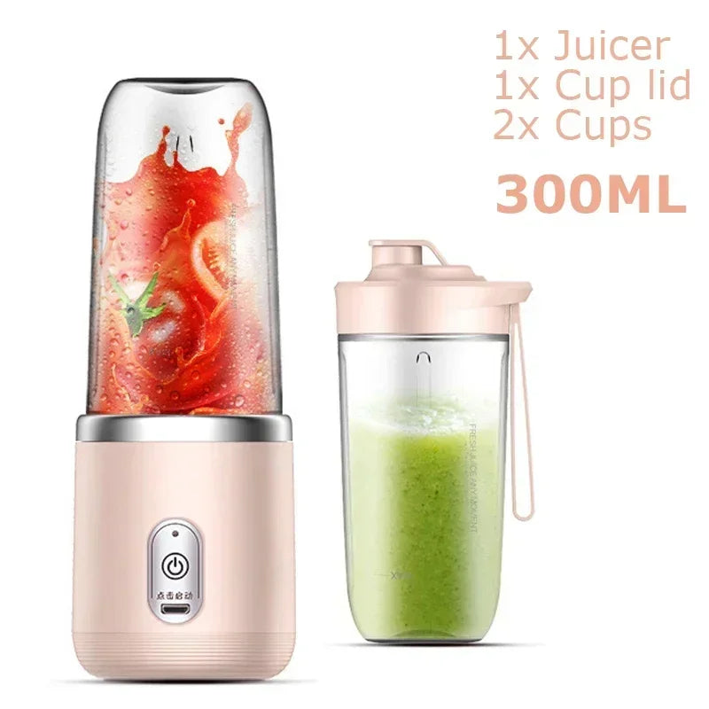 Portable 300ml personal juicer blender in pale pink with two cups and a matching lid, displaying juice inside.