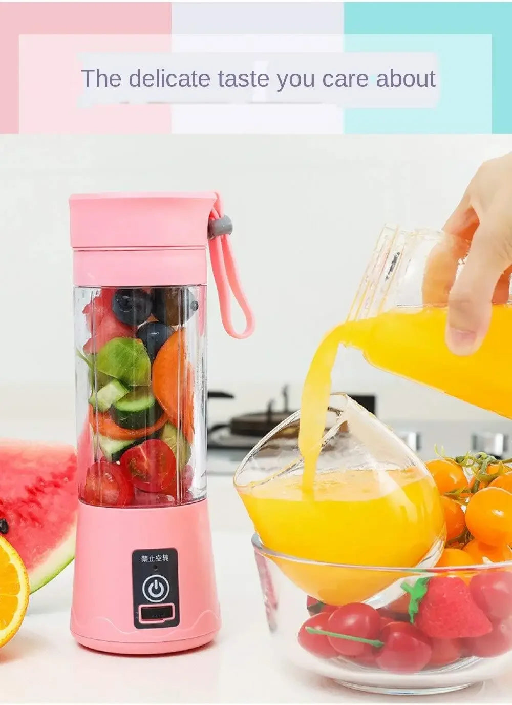 A portable, pink handheld blender bottle with a carry strap, shown next to fresh fruit and a glass of orange juice.