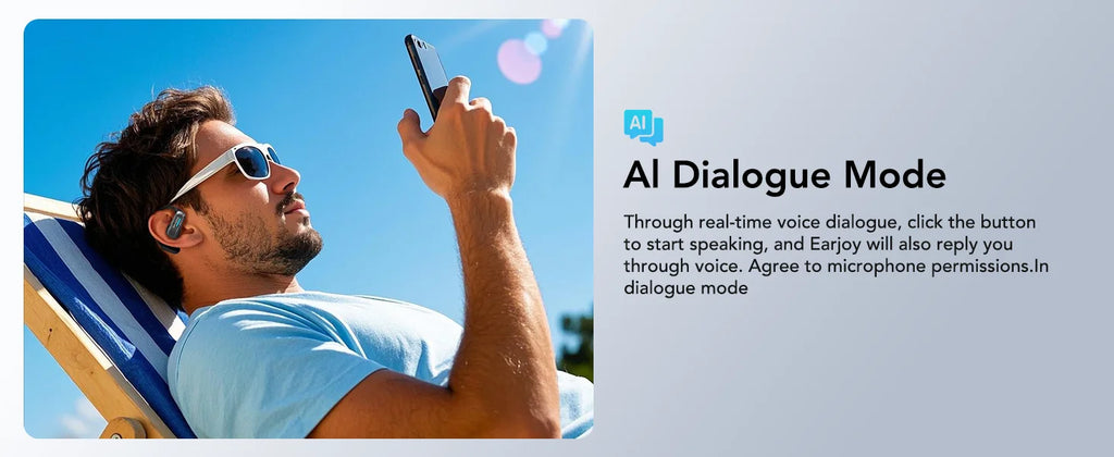 A man in sunglasses wears a sleek black open-ear Bluetooth headset while relaxing in a deck chair using his smartphone.