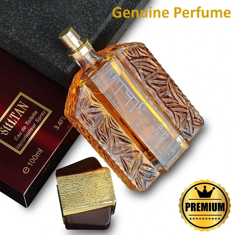 Amber glass 100ml perfume bottle with textured leaf patterns, gold sprayer, dark cap, and matching gift box.