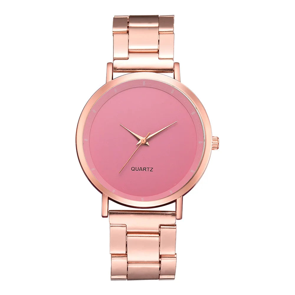 Ladies' rose gold stainless steel watch with a minimalist pink dial and link bracelet strap.