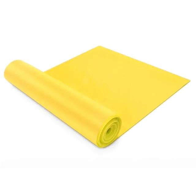Bright yellow resistance band partially rolled out against a plain white background.