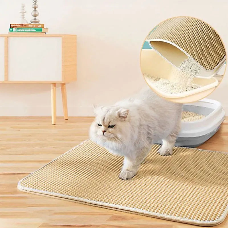 Beige, double-layer, waterproof cat litter mat with a honeycomb texture to trap litter, shown with a fluffy cat.