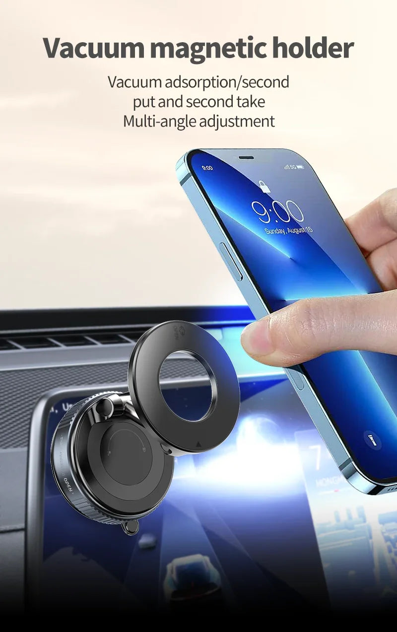 Black circular car vacuum magnetic phone holder being used to mount a smartphone on a dashboard.