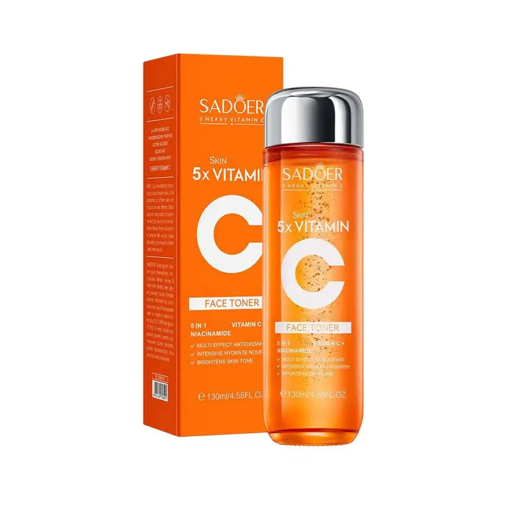 Orange 130ml bottle and box of 5x Vitamin C face toner with Niacinamide for brightening and hydration.