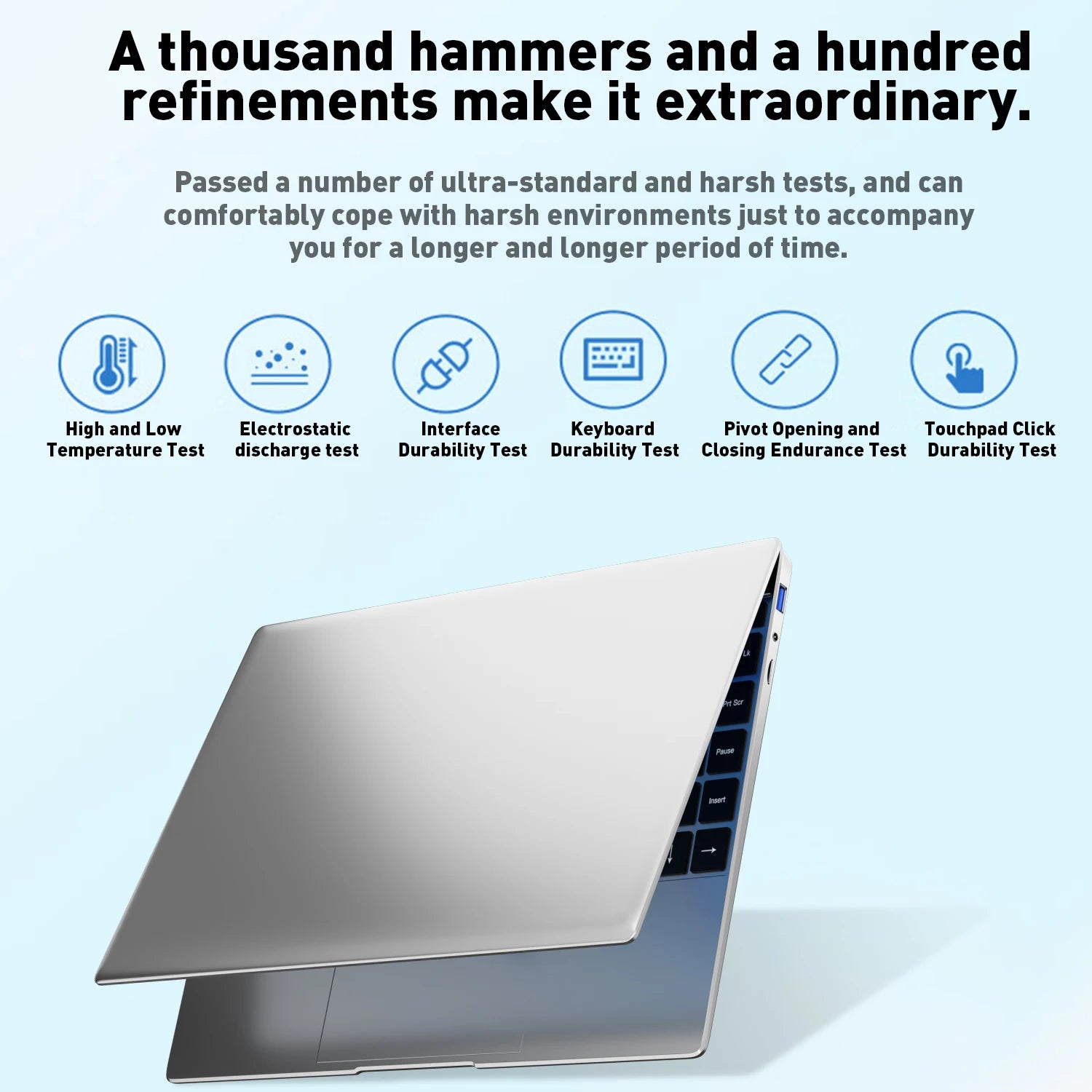 Sleek silver 14.1-inch ultra-slim laptop shown with durable build test icons above.