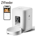 White smart pet feeder with a camera and detachable bowl, shown with a smartphone app interface.