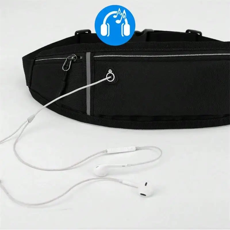Black running belt with a zip pocket, reflective strip, and built-in headphone cable port with white earphones.