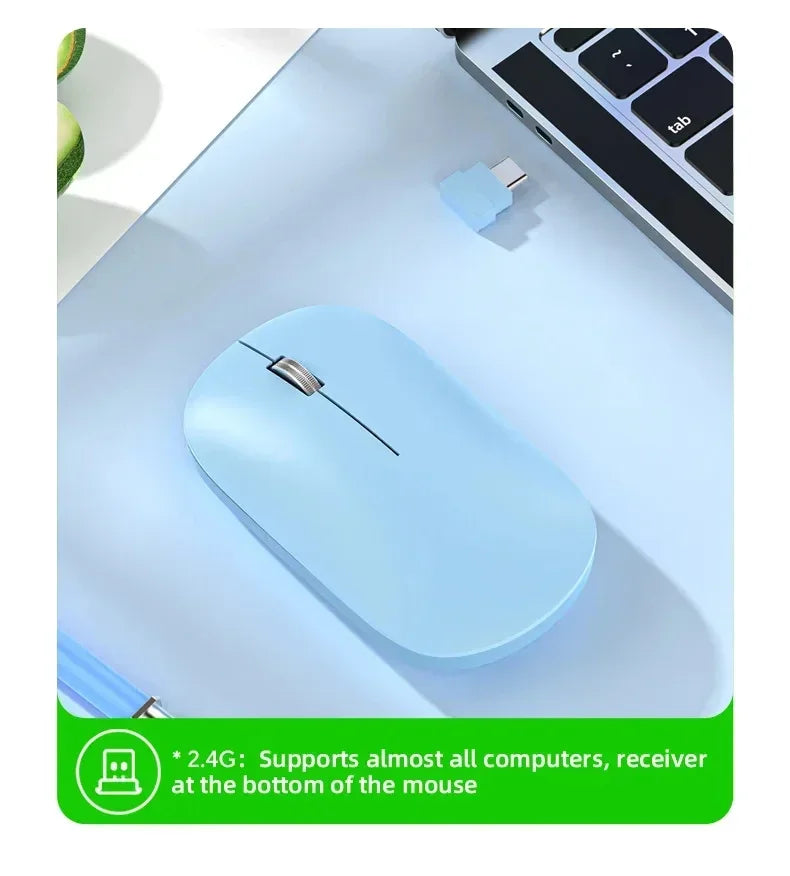 A sleek, pastel blue wireless ergonomic mouse with a metallic scroll wheel, shown next to a laptop and USB receiver.
