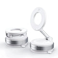 White, foldable circular LED ring light with a metallic textured base and suction cup mount. Shown folded and open.