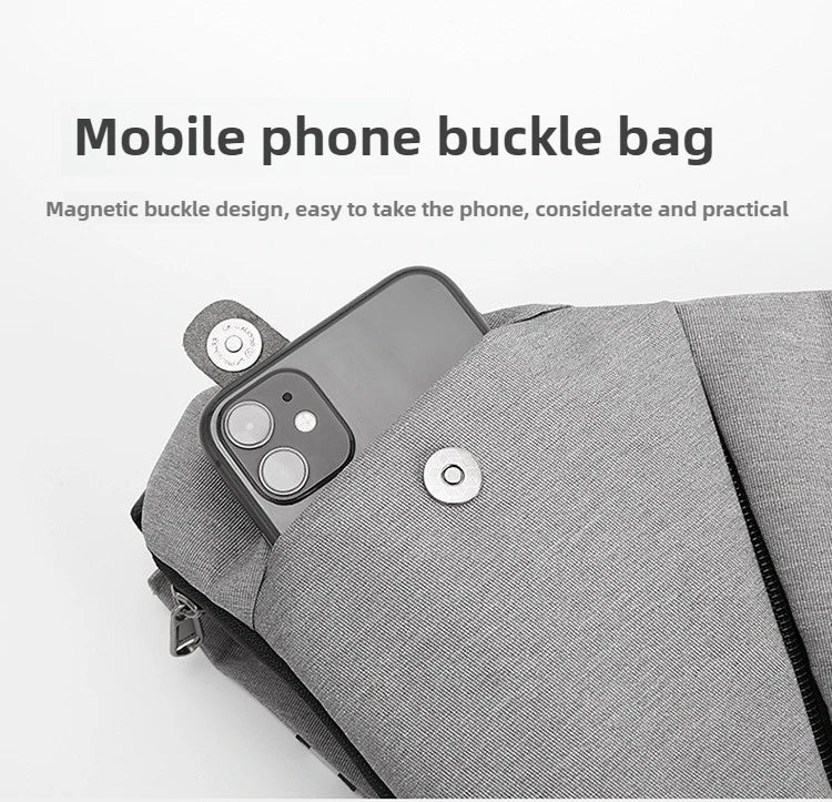 Grey waterproof crossbody messenger bag featuring a secure magnetic buckle pocket for a mobile phone.