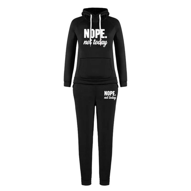 Black lounge tracksuit with hoodie and matching joggers, featuring white 'NOPE. not today' slogan print.
