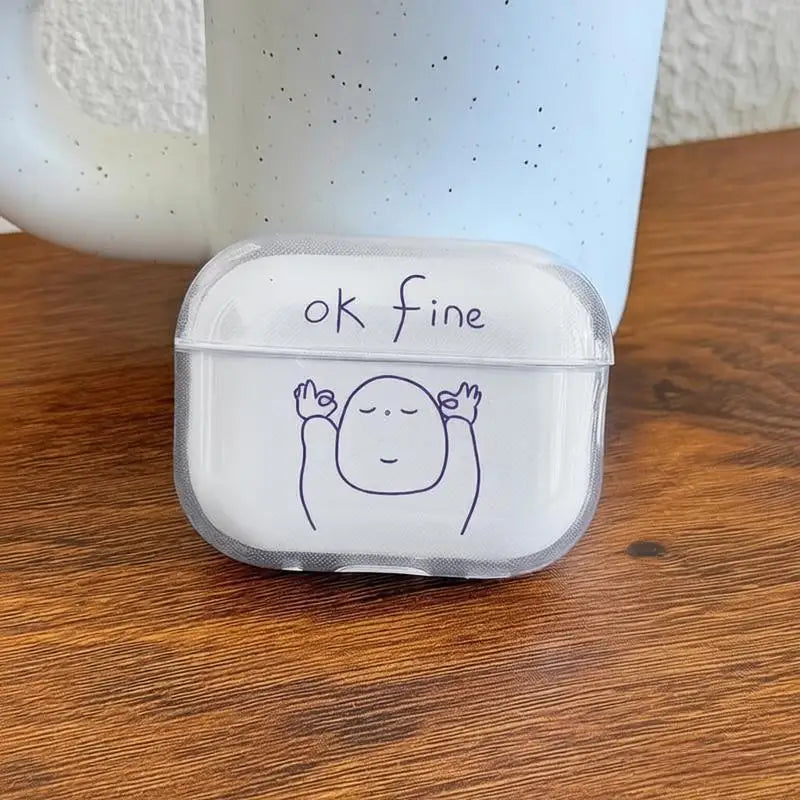 Clear AirPods Pro case featuring a cartoon character making an 'ok' sign with the text 'ok fine' above.