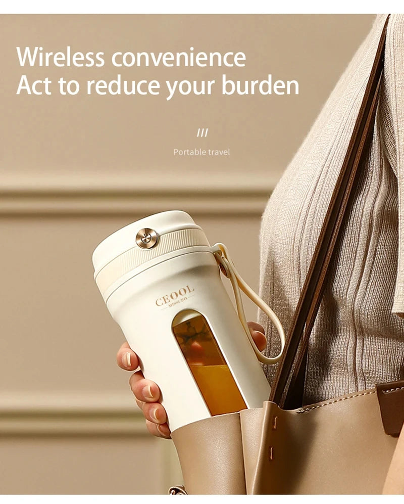 A person holds a portable, cream-colored wireless blender cup with a clear viewing window and a carry strap.