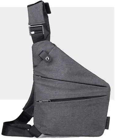 Grey compact anti-theft sling bag with a slim, triangular profile, adjustable strap and multiple zip compartments.