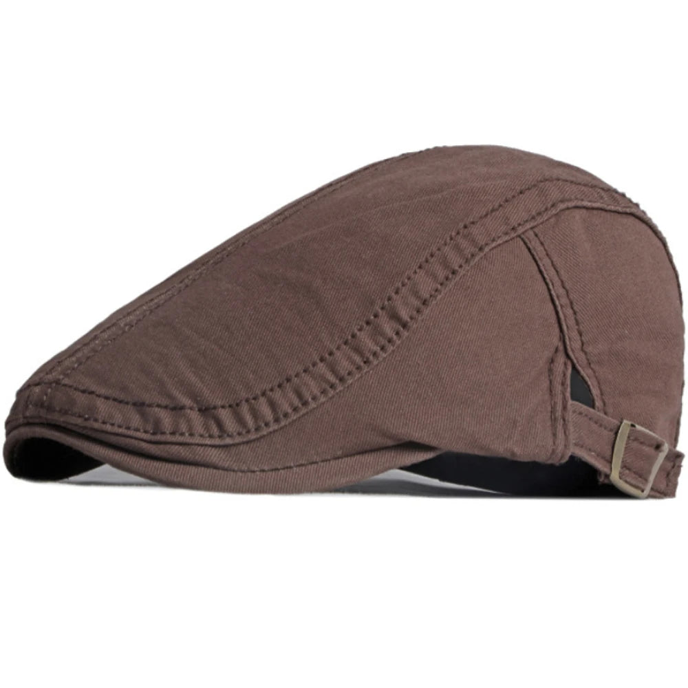 Unisex brown cotton flat cap with stitched panel detailing and an adjustable side buckle strap.