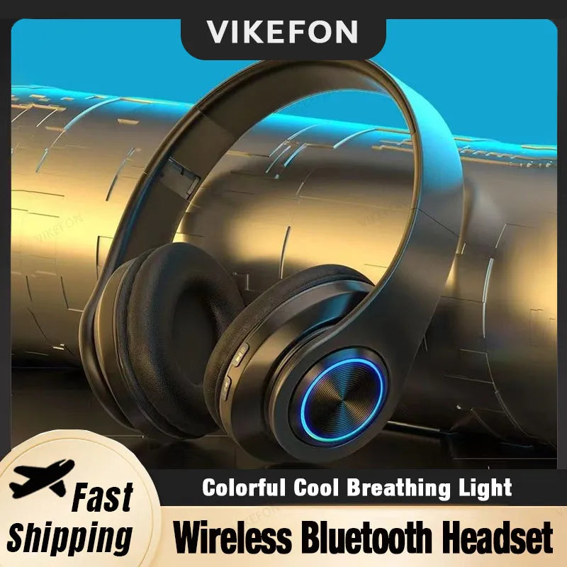 Sleek black wireless gaming headset with cushioned ear pads and a vibrant blue circular LED light feature.