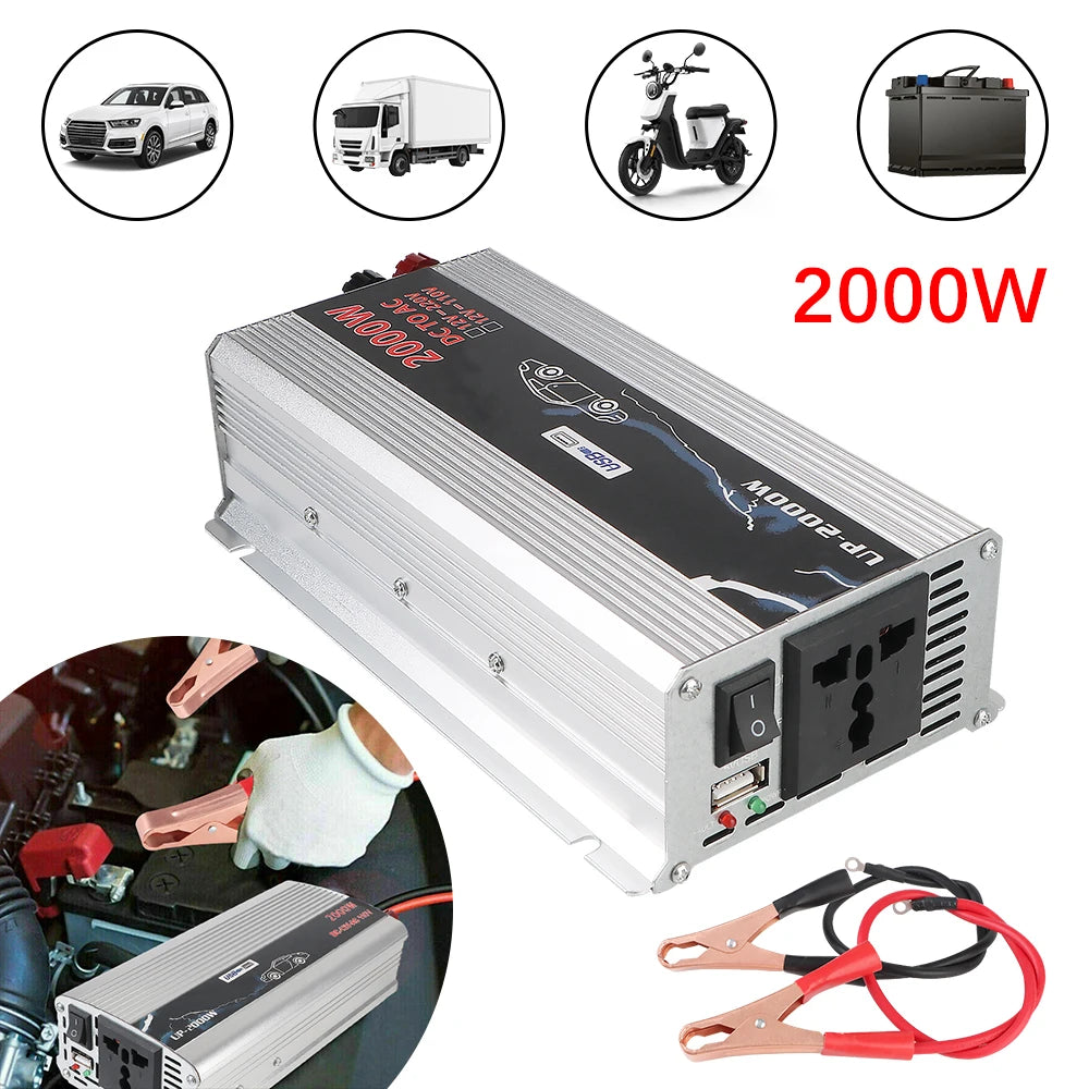 Silver 2000W DC to AC power inverter with USB port, power switch, and black and red battery connection cables.