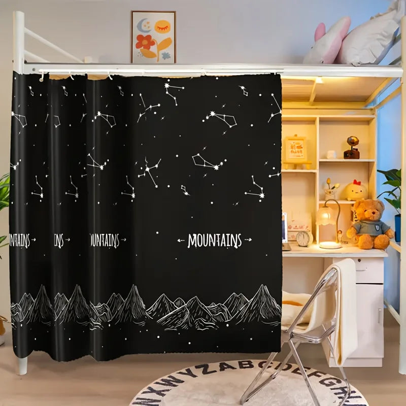 Black privacy bed curtain featuring a white mountain and constellation print on a bunk bed.