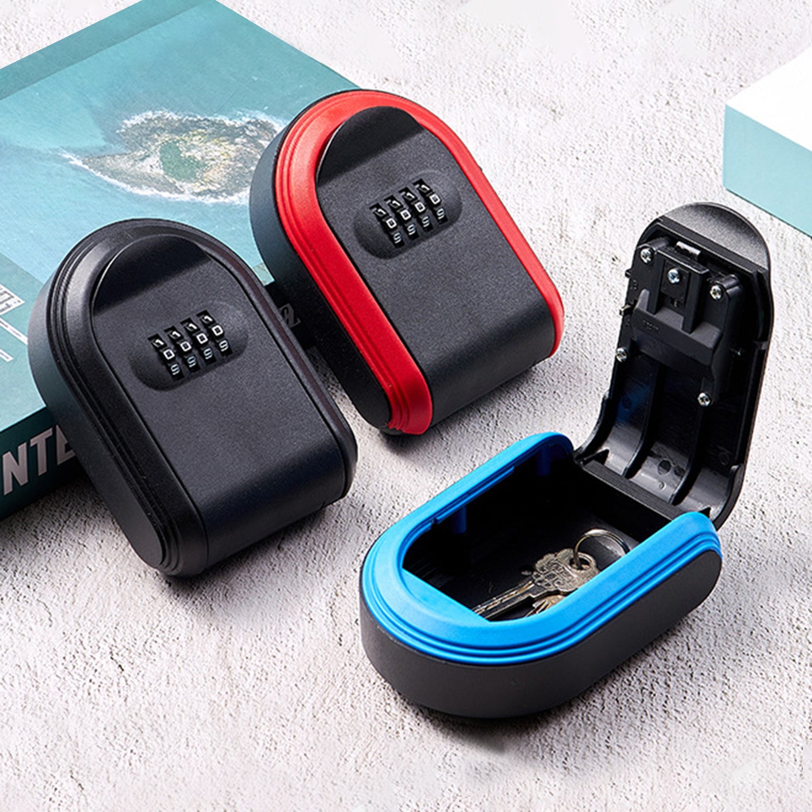 Three black plastic portable key lock boxes with red, blue, and black trim, each featuring a four-digit combination.