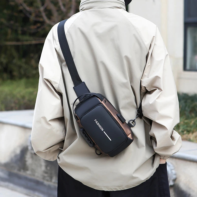 Black and bronze crossbody chest bag with adjustable strap, integrated USB charging port and anti-theft design.