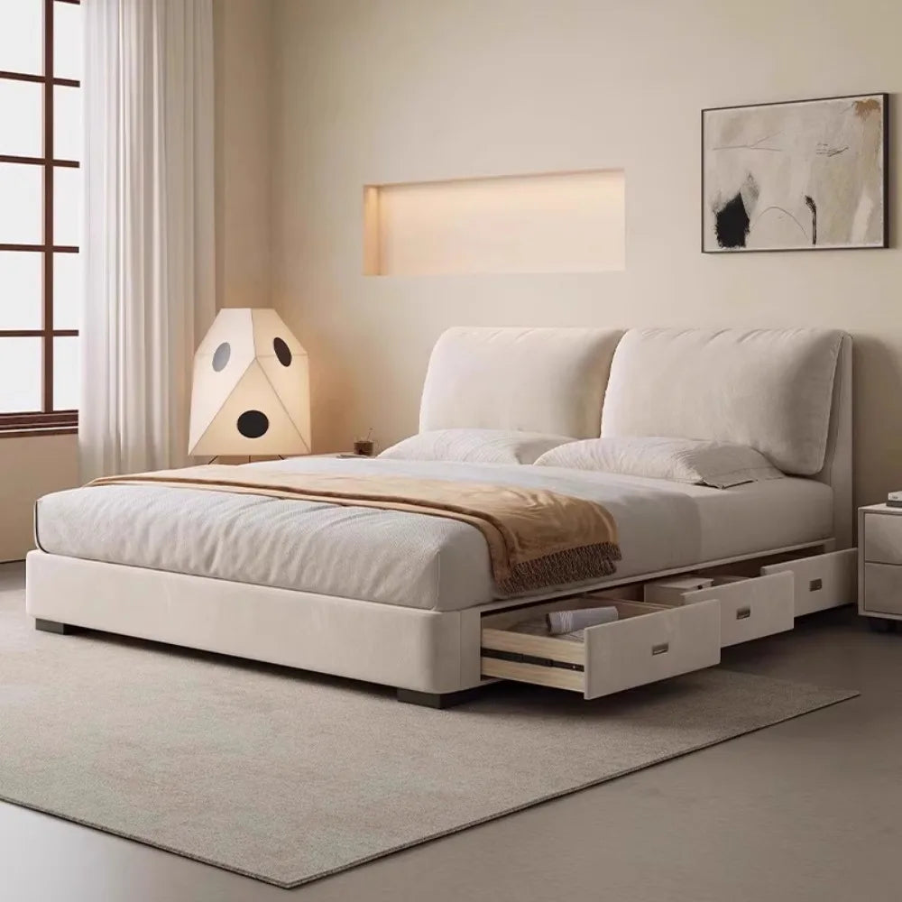 Modern, cream-coloured fabric double bed with a plush padded headboard and integrated side storage drawers.