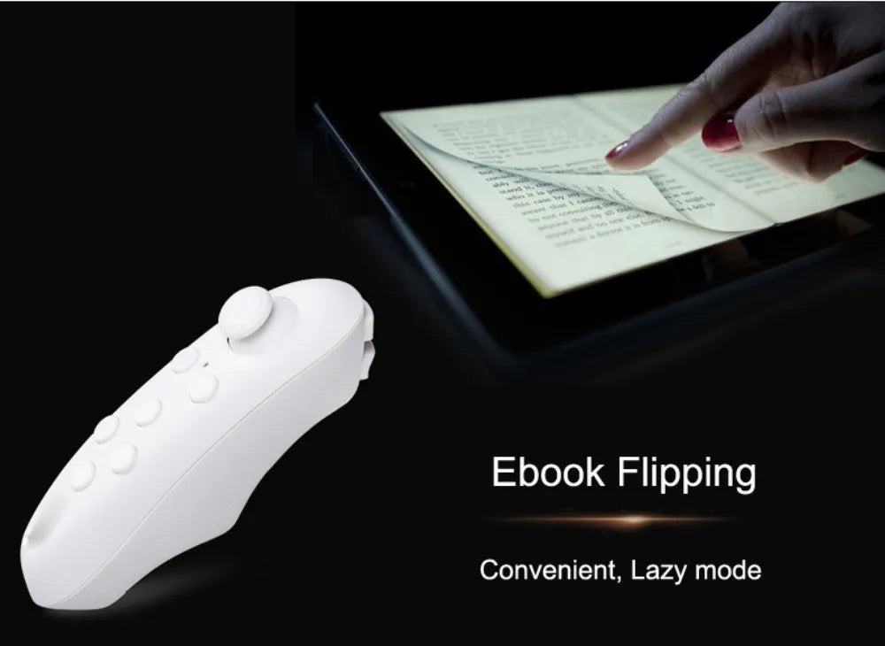 White handheld remote controller with buttons, used to flip pages on an ebook reader shown in the background.