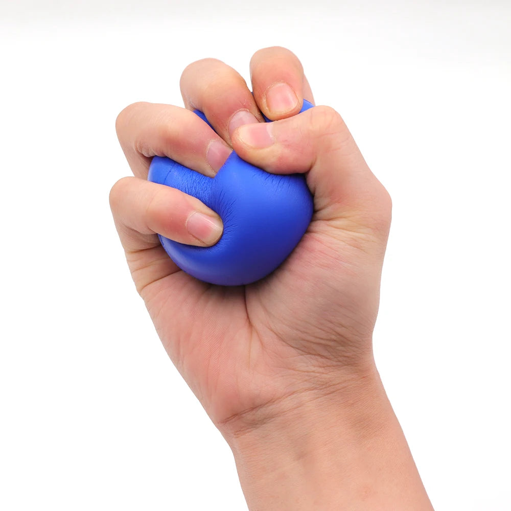 A hand squeezing a round, bright blue stress ball, isolated on a white background.