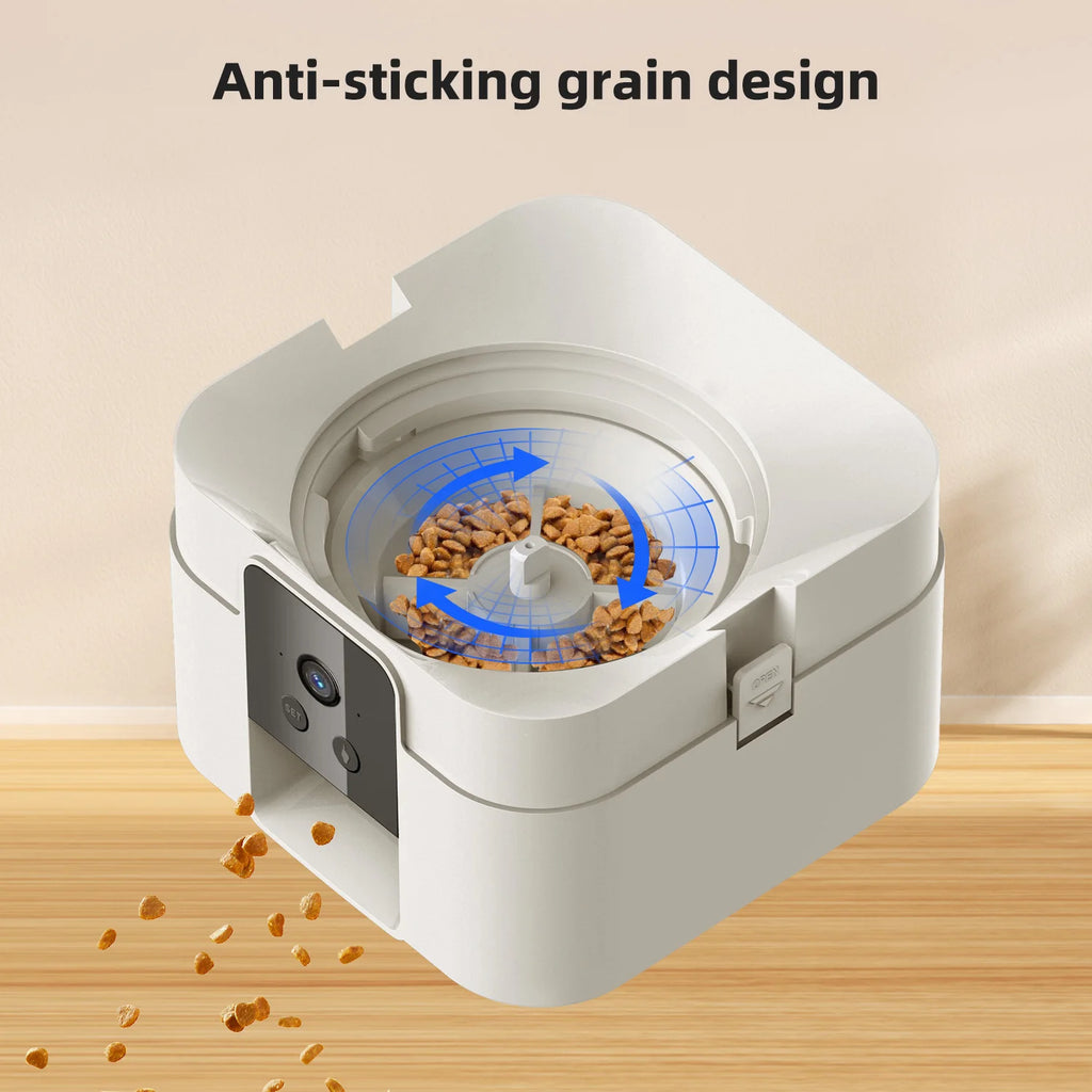 White automatic pet food dispenser with internal rotating mechanism to prevent kibble from sticking.