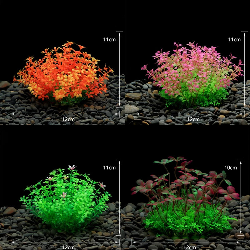 Four artificial aquarium plants in orange, pink, bright green, and reddish tones, set on black gravel with dimensions.