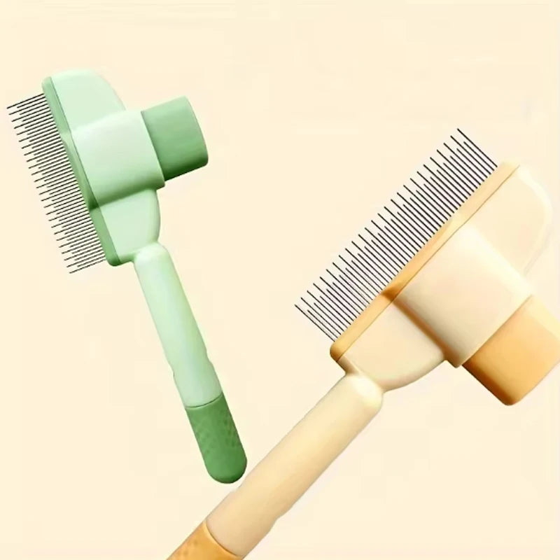 Two pet grooming combs with fine metal teeth, one sage green and one cream, set against a pale background.