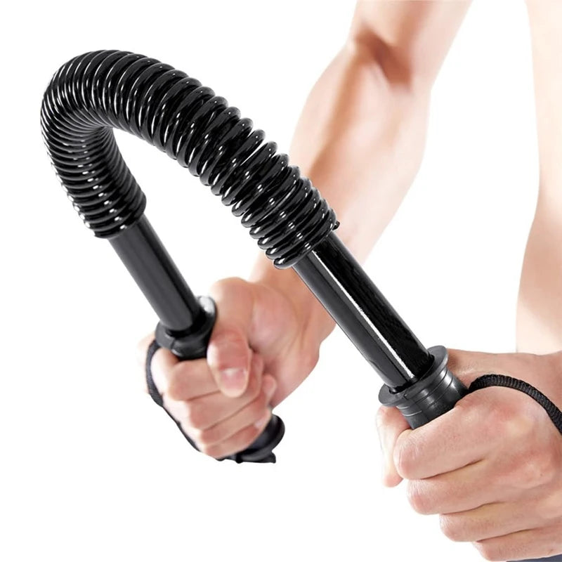 Black metal arm strength exerciser with a coiled spring center and hand grips held by a person.