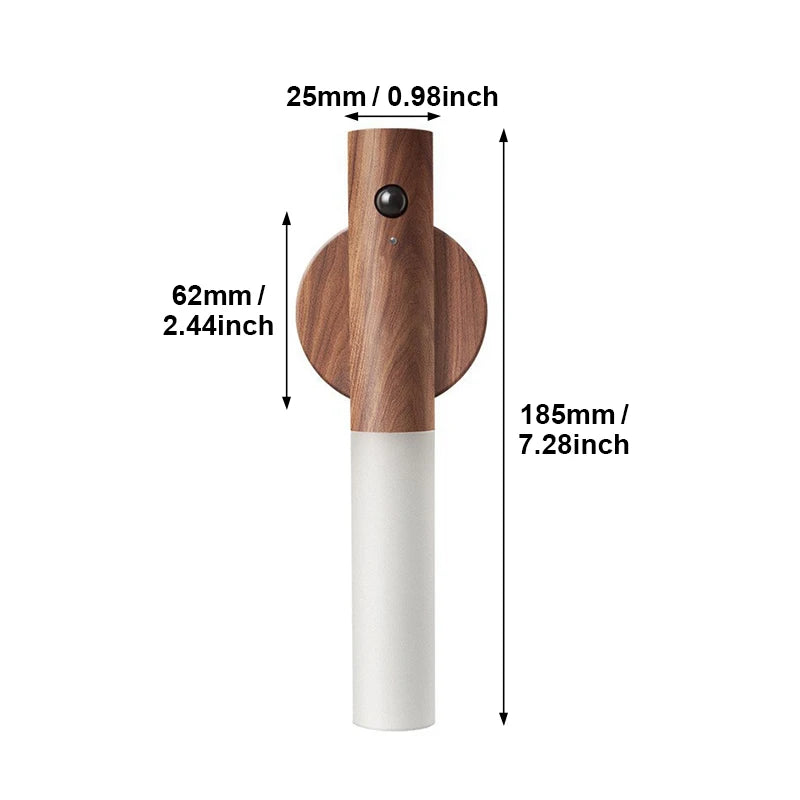 Minimalist wood-effect motion sensor LED night light with a frosted white diffuser and wall-mounting dimensions.