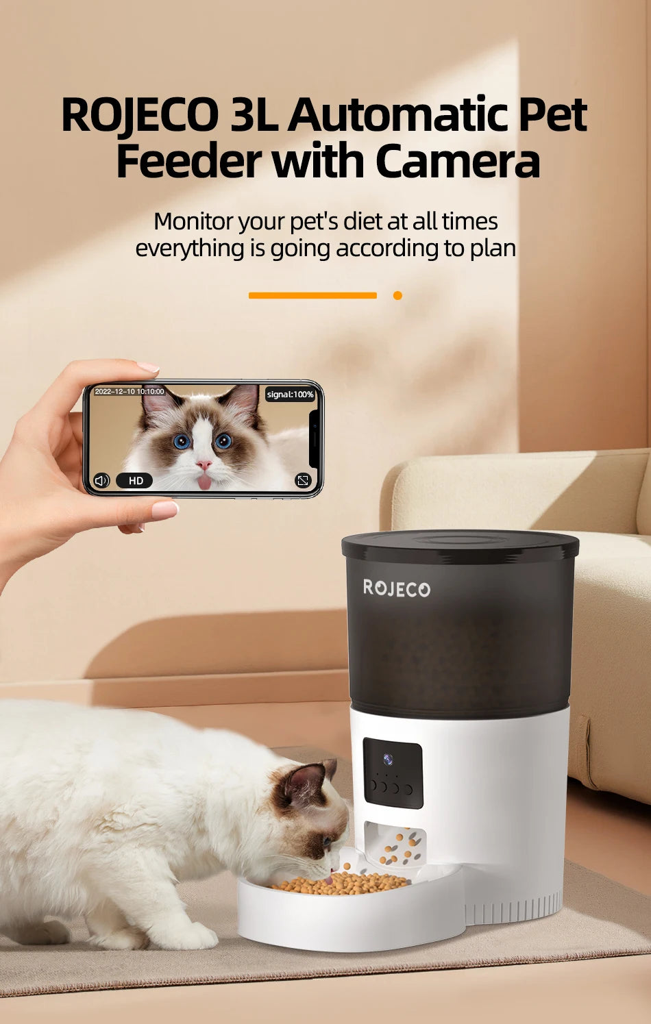 A white and black automatic pet feeder with a camera, shown with a cat eating while being monitored on a smartphone.