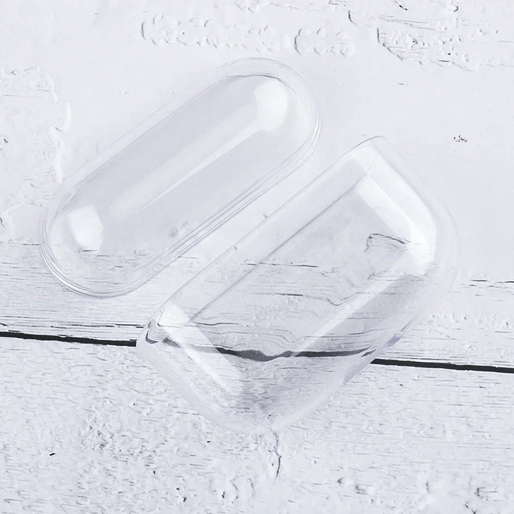 Clear protective case for AirPods, two-piece hard plastic shell on a white wooden background.