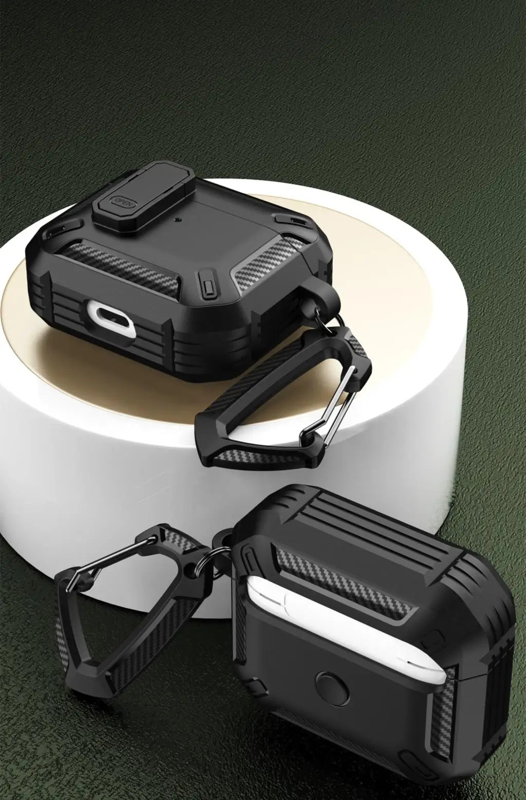 Rugged black carbon-fibre style protective case for AirPods with integrated locking latch and carabiner clip.