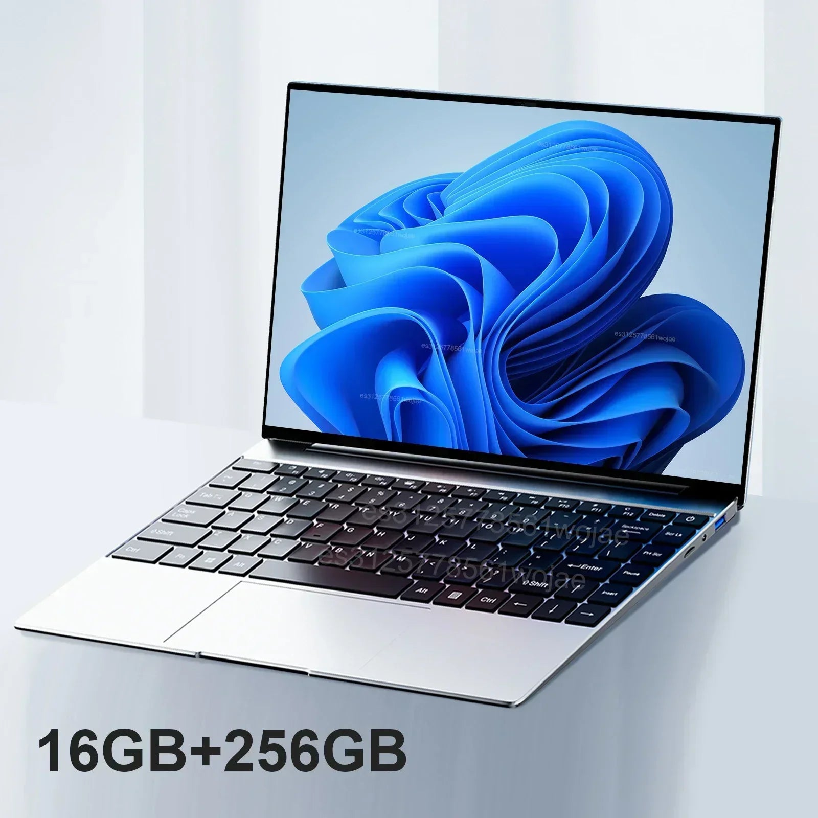 Ultra-slim silver 14.1-inch laptop with a black keyboard and a bright blue abstract wallpaper on screen.